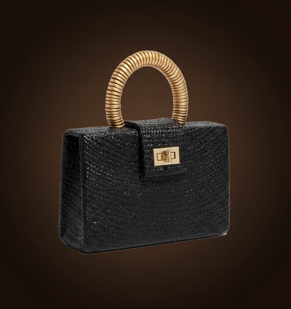Soli & Sun Noir Solstice black buntal clutch with shell inlay handle and gold bead accents. ZoharasVogue