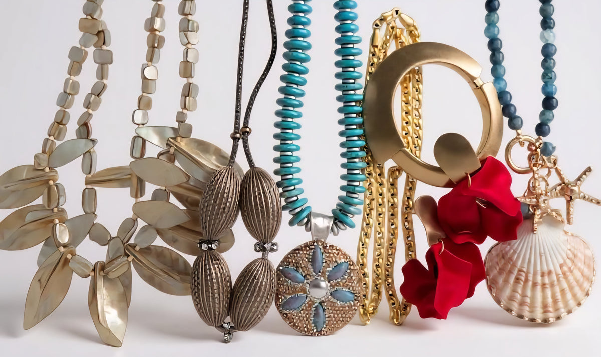 Fashion jewelry collection featuring gold and silver necklaces.