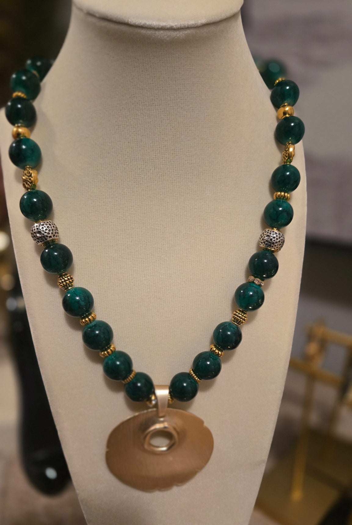 Verdant Heirloom Zafira Collection green beaded necklace with gold-toned medallion pendant