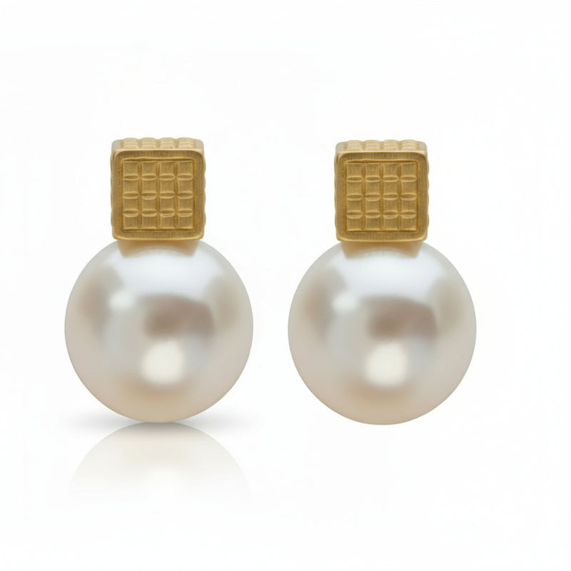 Amora Heart Pearl Earrings — 14K gold-plated heart studs with luminous pearls, handcrafted for timeless romance and modern sophistication. ZoharasVogue