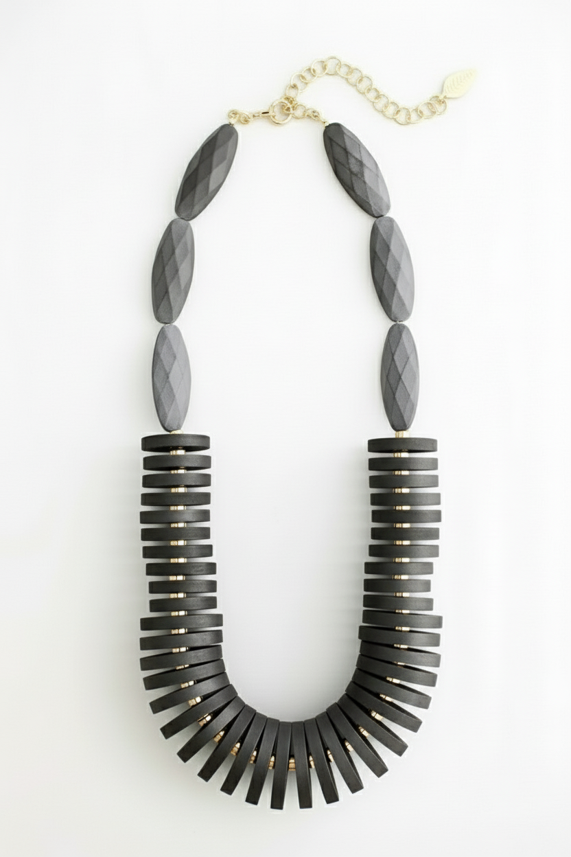 Shop the Artisan Essence Necklace — a handcrafted 21-inch statement piece made from acrylic, painted wood, and brass. Made to order in New Jersey, each necklace is uniquely one of a kind.ZoharasVogue