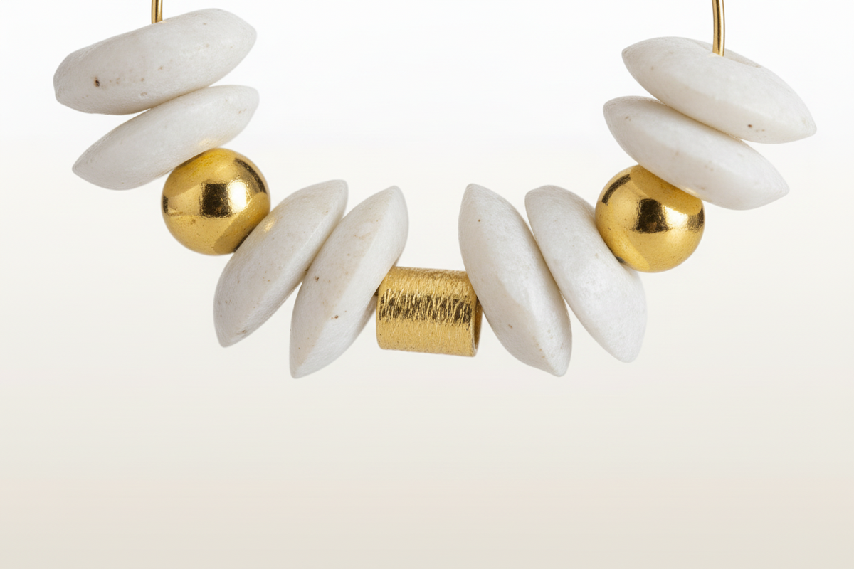 Gold-filled hoop chandelier earrings with white Ashanti recycled glass beads and a gold wood barrel accent.+ZOHARAS VOGUE