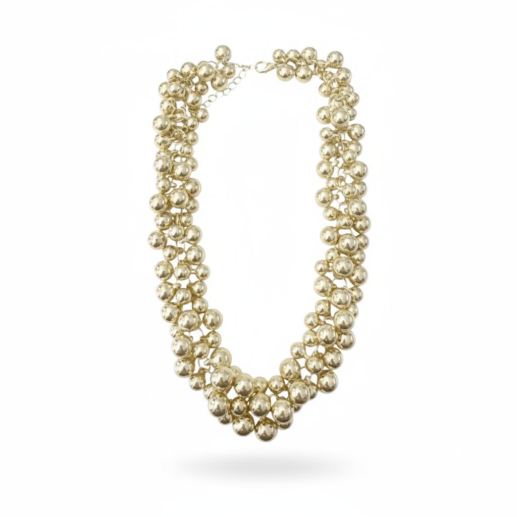 Polished plated beaded statement necklace with layered design, bold and modern jewelry.