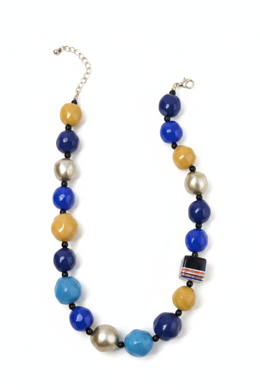 Cobalt Mosaic Statement Necklace, cobalt blue, mustard yellow, turquoise and pearl-tone beaded statement necklace with black spacers, striped accent bead and silver-tone adjustable clasp. ZoharasVogue 