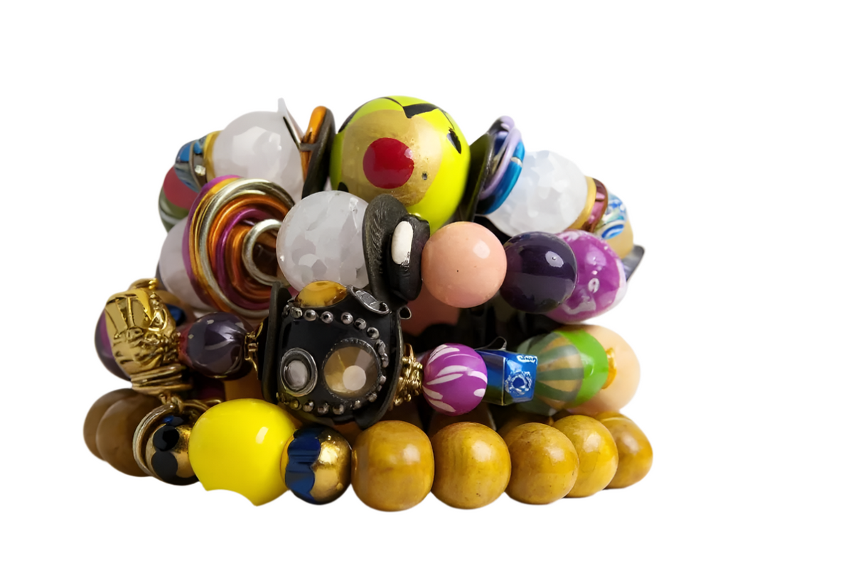 A vibrant 4-piece multicolor beaded bracelet stack with wire accents, styled for boho-chic fashion.
