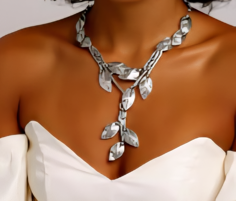 Silver crystal leaf necklace with a sculpted chain design - Zoharas Vogue 