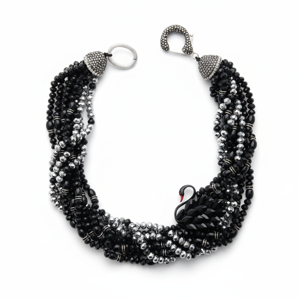 Elara Midnight Swan Necklace featuring layered faceted black and silver glass beads with rhinestone details and oversized pavé clasp.