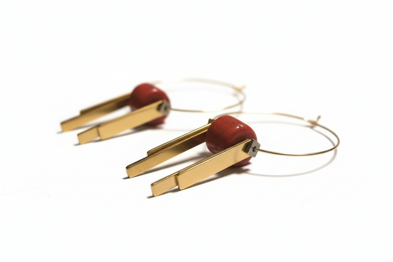 Elena Hoops close-up showing 18K gold-plated brass hoops with natural carnelian barrel bead and dual brass bar fringe drops - artisan handcrafted earrings. ZoharasVogue 