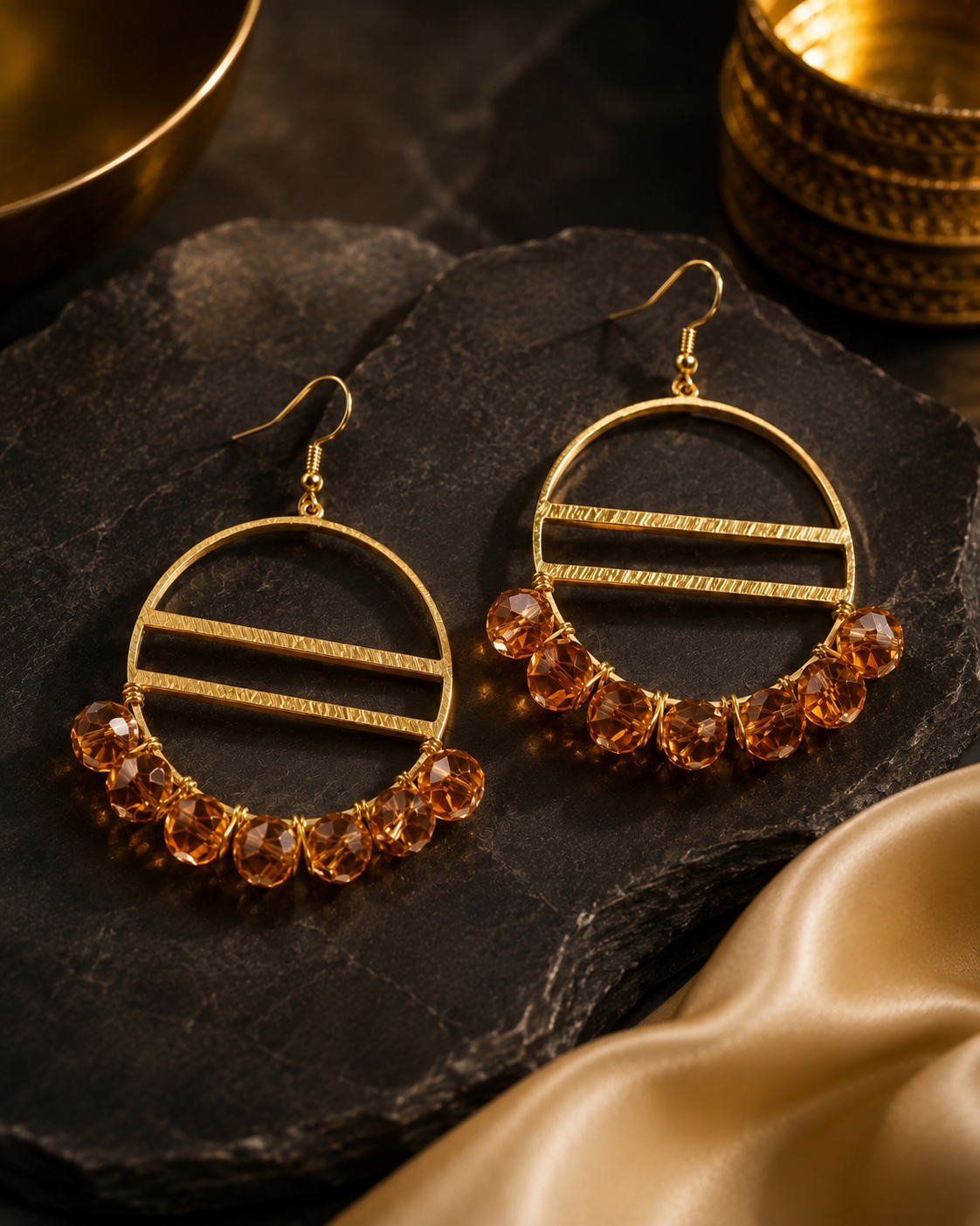 Golden Amber Eclipse 18K gold-plated hoop earrings with faceted amber crystals 