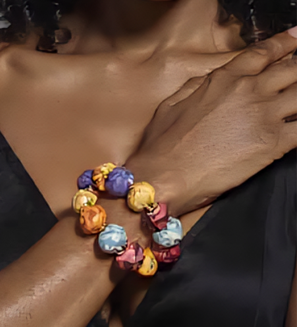 Colorful fabric beaded bracelet with gold accents, handcrafted from repurposed Kantha textiles. Zoharas Vogue