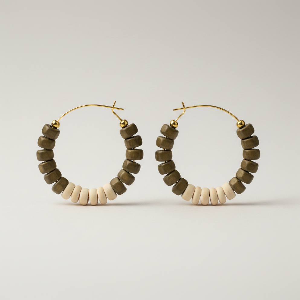 18k gold hoop earrings, cowrie shell hoops, hematite bead earrings, sage green jewelry, medium hoop earrings, statement hoops, Caribbean jewelry, boho gold earrings, coastal earrings, artisan hoop earrings, natural shell jewelry, modern bohemian hoops, gold plated earrings