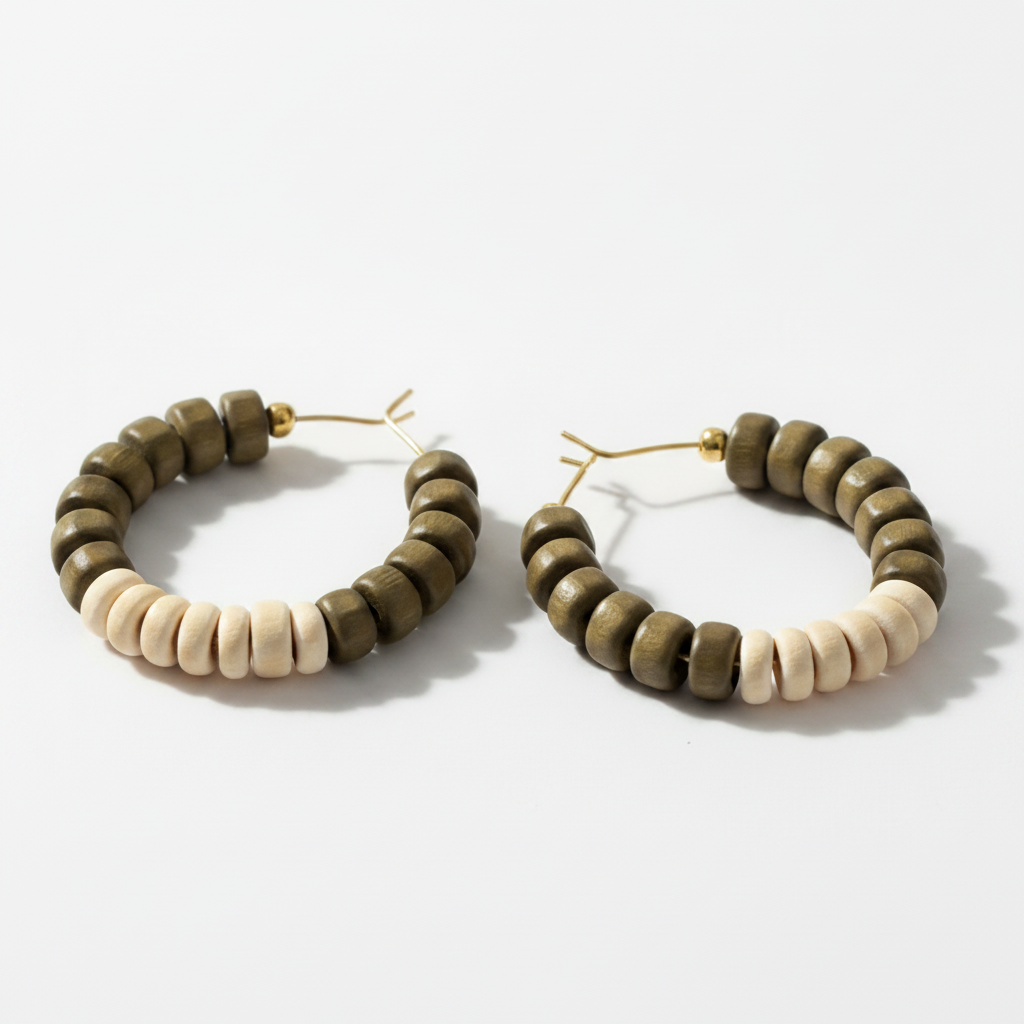 18k gold hoop earrings, cowrie shell hoops, hematite bead earrings, sage green jewelry, medium hoop earrings, statement hoops, Caribbean jewelry, boho gold earrings, coastal earrings, artisan hoop earrings, natural shell jewelry, modern bohemian hoops, gold plated earrings. ZoharasVogue