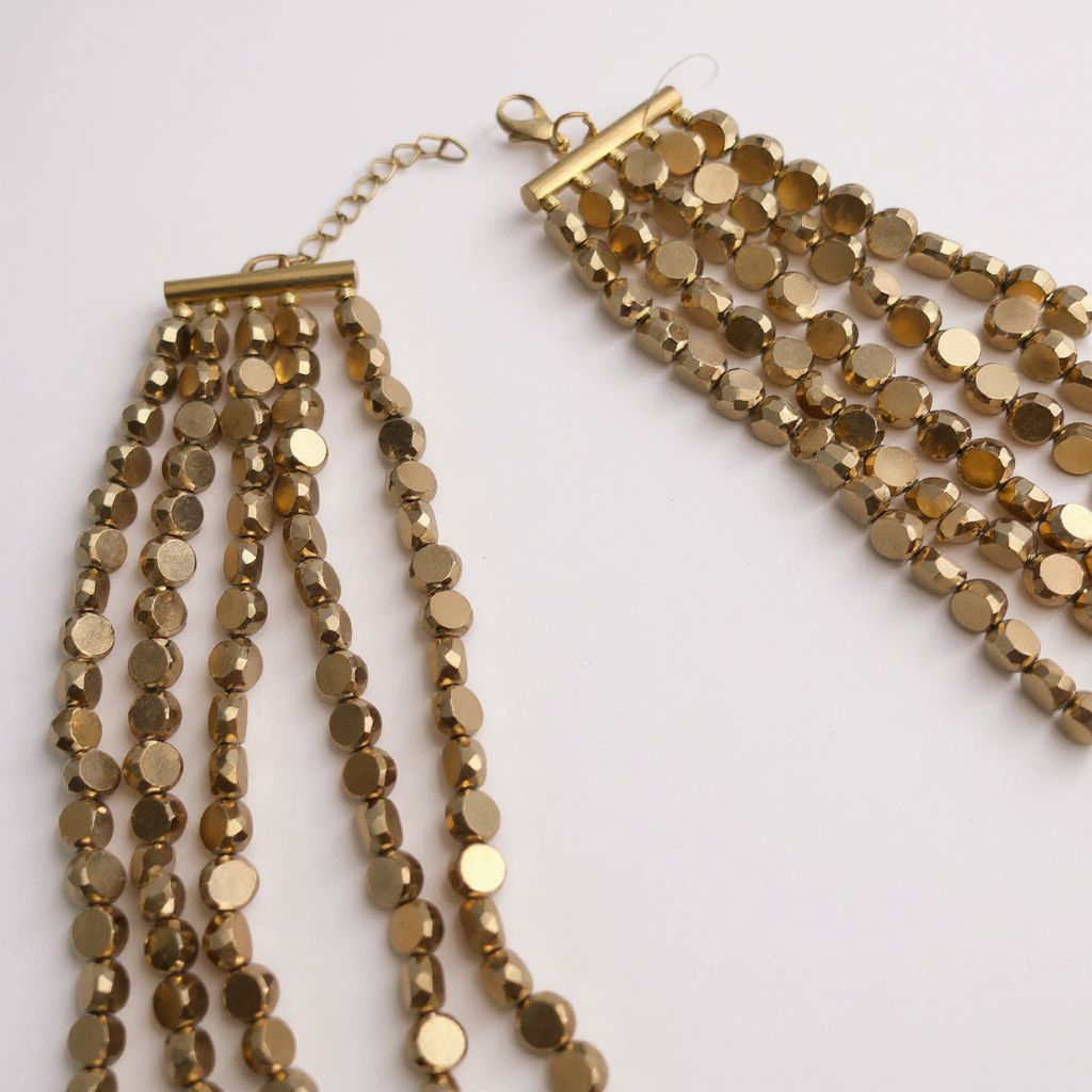 Isabella ZoLuxe Multi-Layer Golden Beads Bib Necklace featuring cascading golden acrylic beads in European-inspired layered design, statement fashion jewelry for women.