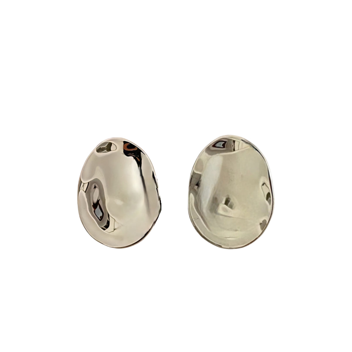 Bold yet elegant, the Luna Brisa Sculpt Earrings redefine statement jewelry with their oval, geometric design. ZoharasVogue