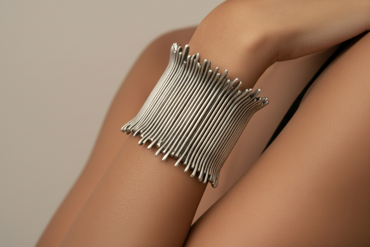 Model wearing Silver bracelet on a person's wrist against a neutral background_ZoharasVogue 
