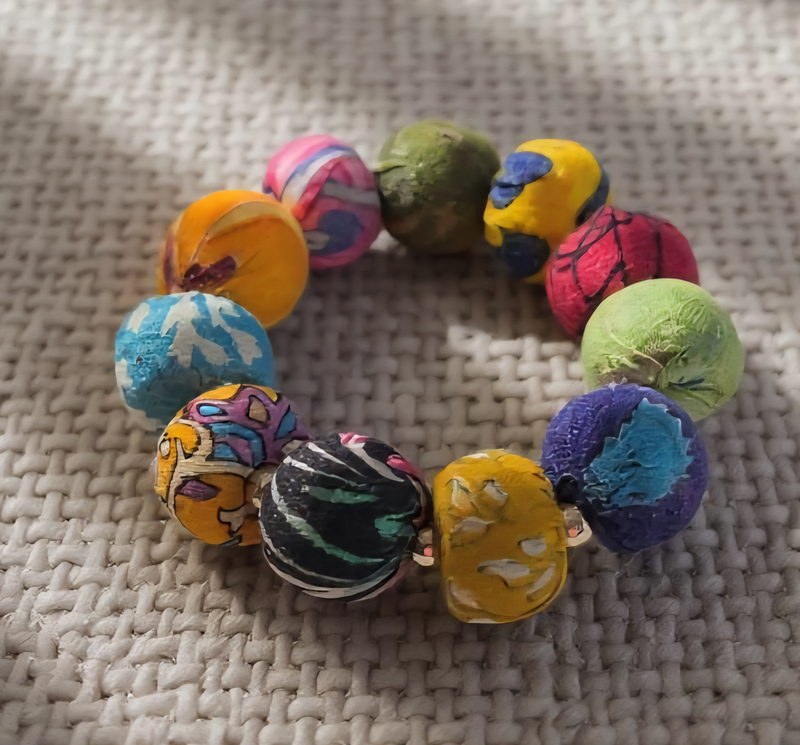 Colorful fabric beaded bracelet with gold accents, handcrafted from repurposed Kantha textiles. ZoharasVogue