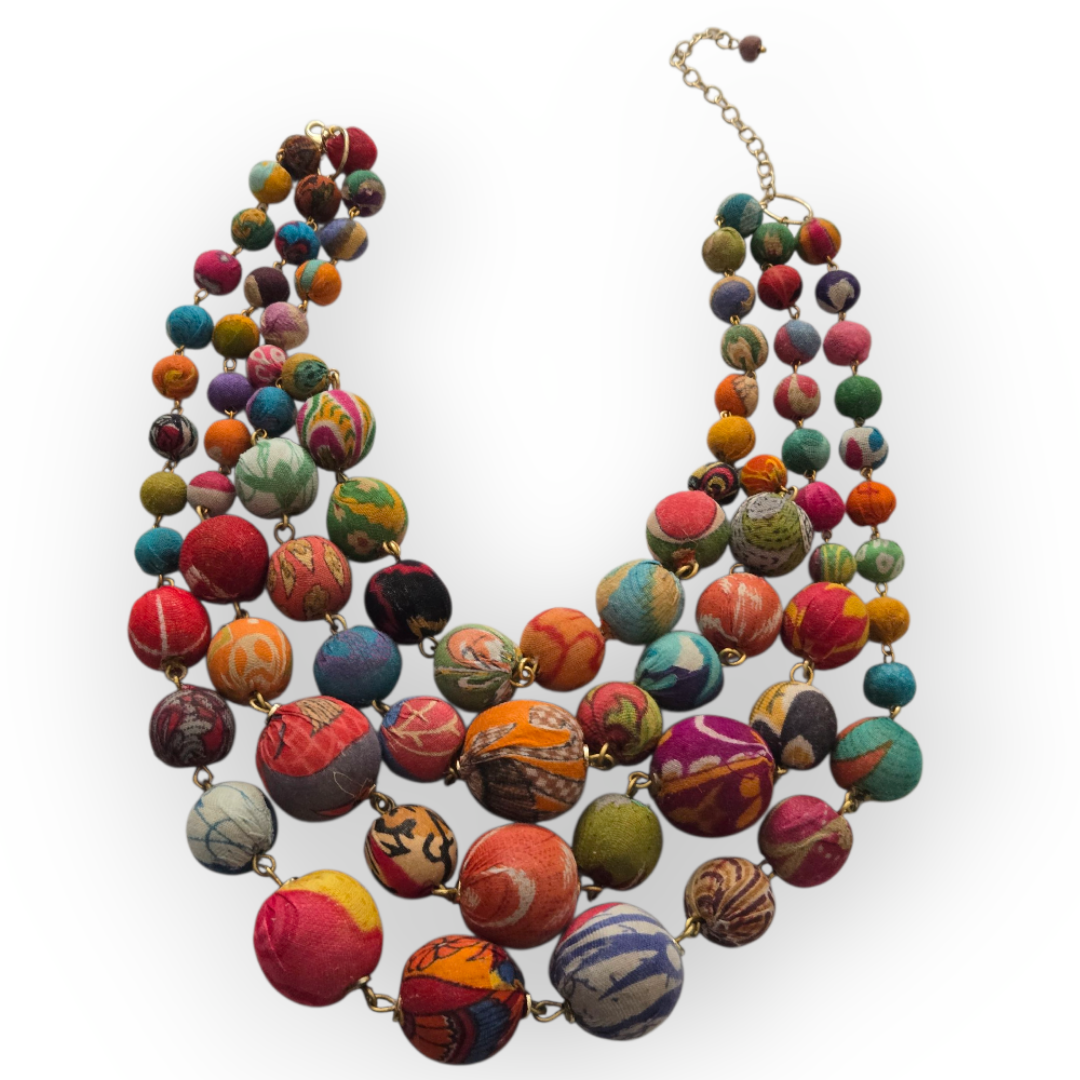 Multi-strand Kantha bead necklace with bold cascading design, handcrafted from repurposed sari textiles in vibrant colors. ZoharasVogue