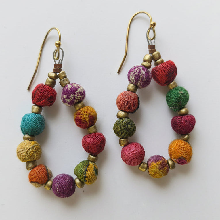 Colorful beaded earrings on a white background ZoharasVogue 