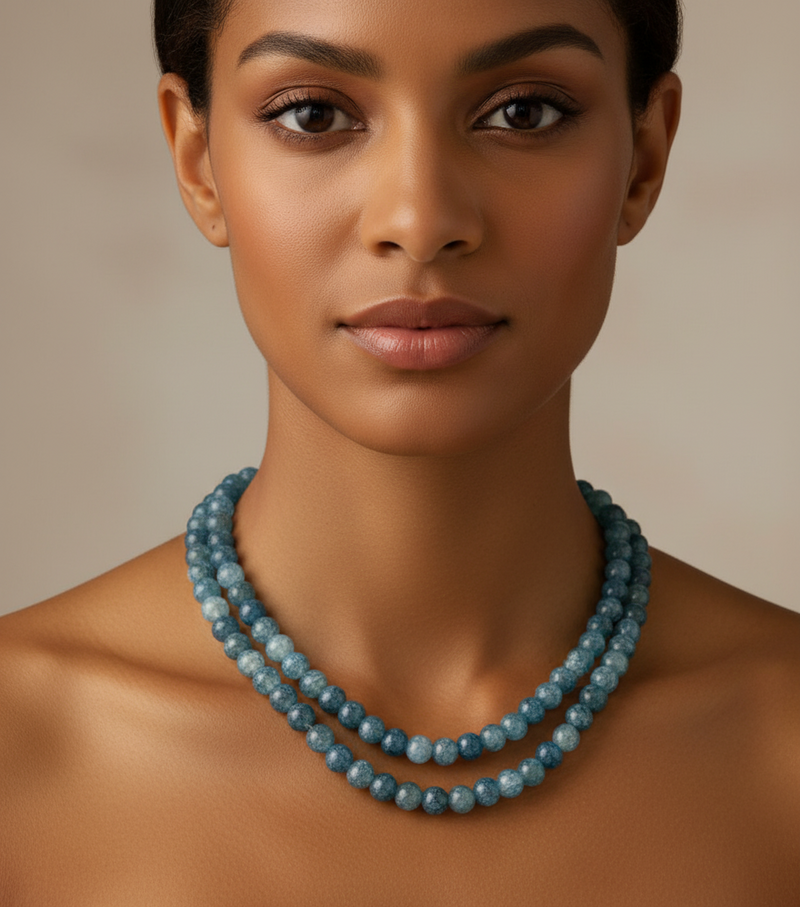 The Nyah Water Drop Pendant Necklace features a sculptural gold-tone beaded choker, lightweight CCB accents, and a geometric water-drop pendant. A vintage-inspired yet modern statement piece designed for bold, artistic styling.