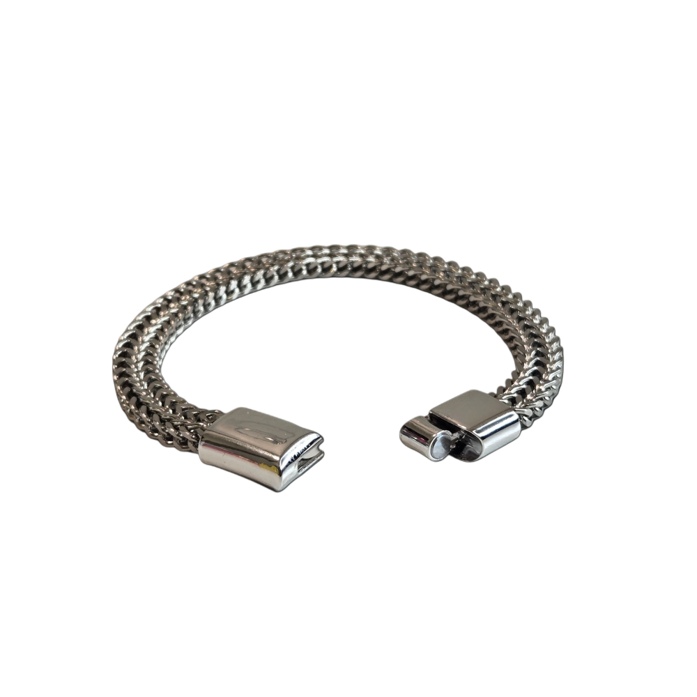 Metallic bracelet with clasp on a white background_ZoharasVogue