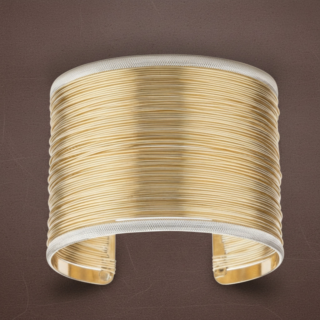 Gold cuff bracelet on a white background_ZoharasVogue