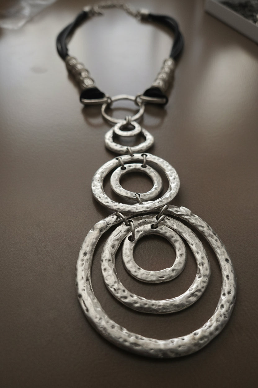 Silver Boho Echo Necklace against a gray background