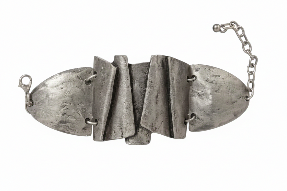 Silver bracelet with geometric design on a white background_ZoharasVogue