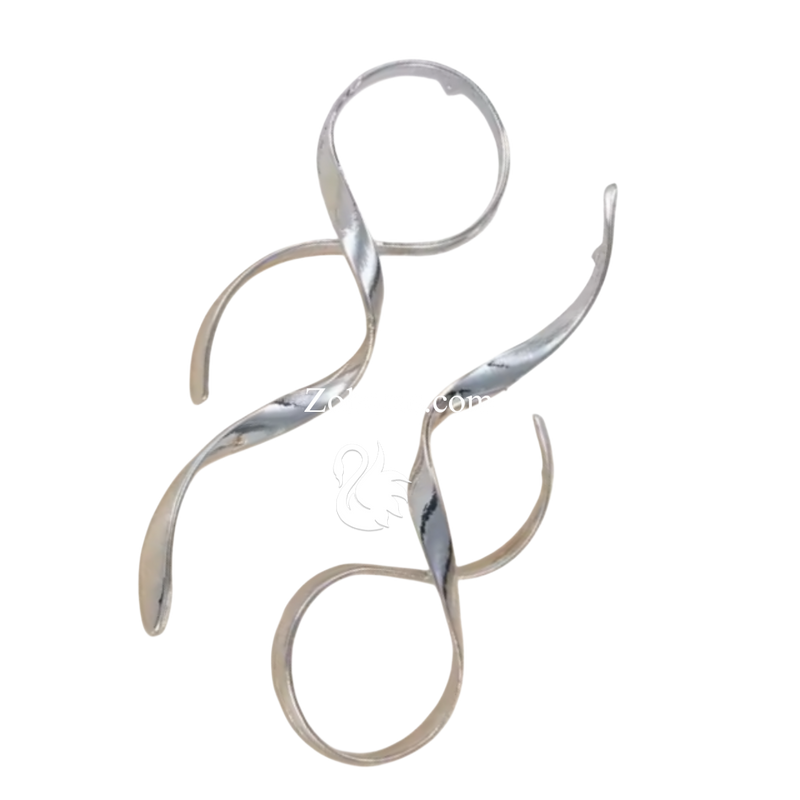 Make a statement with Zoharas Vogue Sofia Asymmetric Line Earrings. These vintage-inspired silver earrings feature a bold, asymmetric long-line design with irregular shapes, adding an artistic touch to any look. Crafted from durable stainless steel and iron alloy, they offer a sleek, modern vibe with a secure push-back closure for all-day comfort. Perfect for elevating any style from casual to chic.