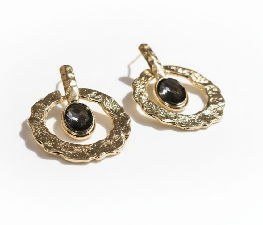 Gold earrings with black gemstones on a white background_ZoharasVogue
