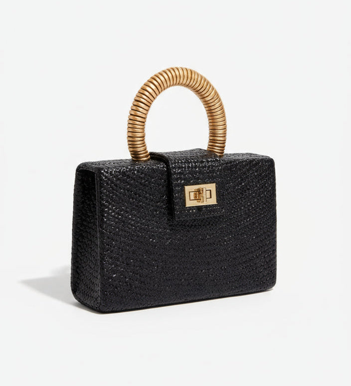 Soli & Sun Noir Solstice black buntal clutch with shell inlay handle and gold bead accents. ZoharasVogue