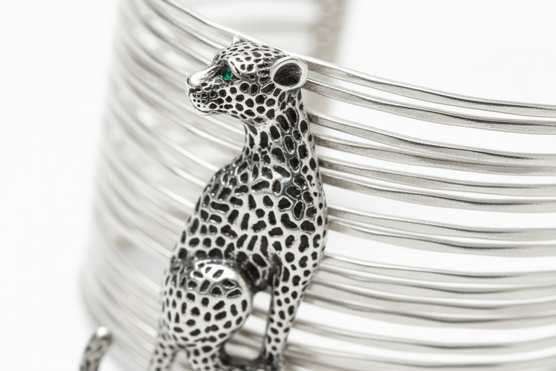 The Savannah Cuff featuring oxidized leopard charm with green eyes on multi-strand wire cuff - handcrafted statement jewelry by ZoharasVogue