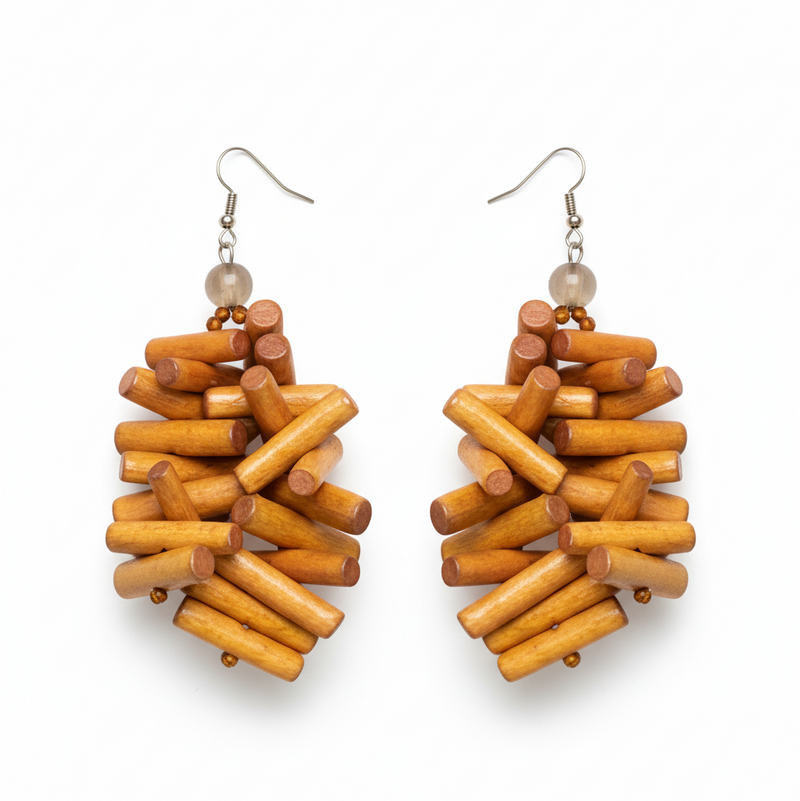 Uncompromised Earrings with textured natural elements and leaf detail, perfect for elegant high-fashion styling.ZoharasVogue