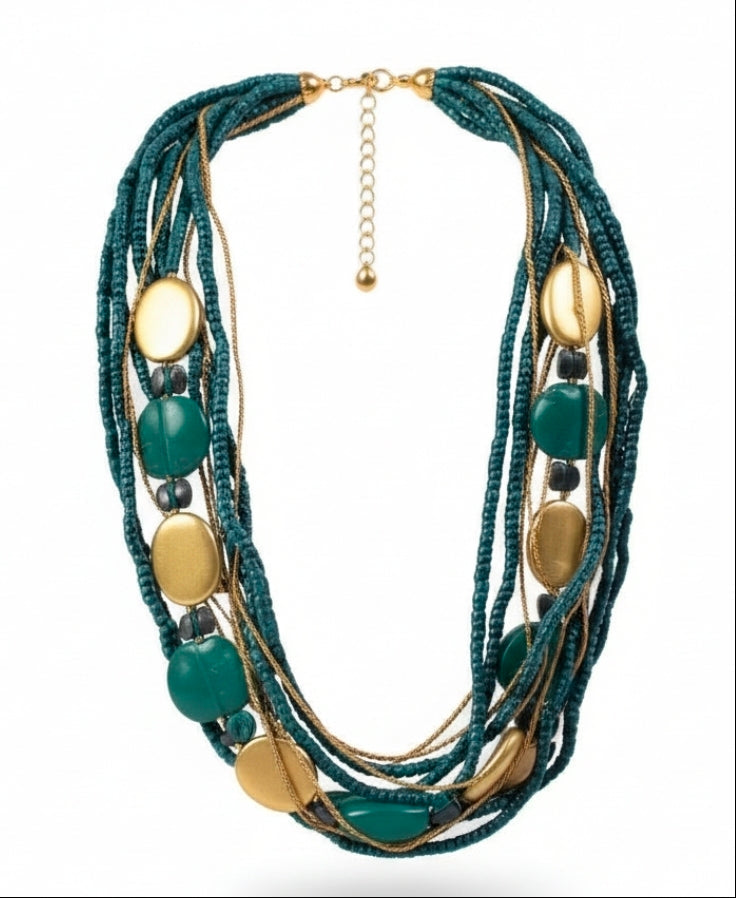 Handcrafted necklace made of coconut shell and Gmelina wood beads with turquoise and gold accents.