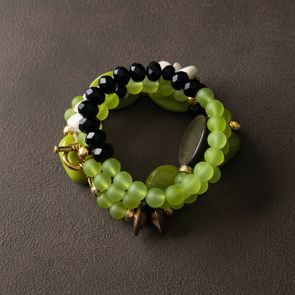 The Vogue Verdict Multi-Stand Bracelet beaded bracelet with green and black beads on a background_ZoharasVogue