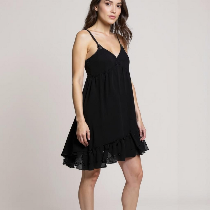 black sleeveless dress is designed to flatter with its clean square neckline and adjustable shoulder straps for a customized fit. Crafted from lightweight, breathable fabric, it drapes gracefully into a relaxed, knee-length silhouette that moves with ease. ZoharasVogue 