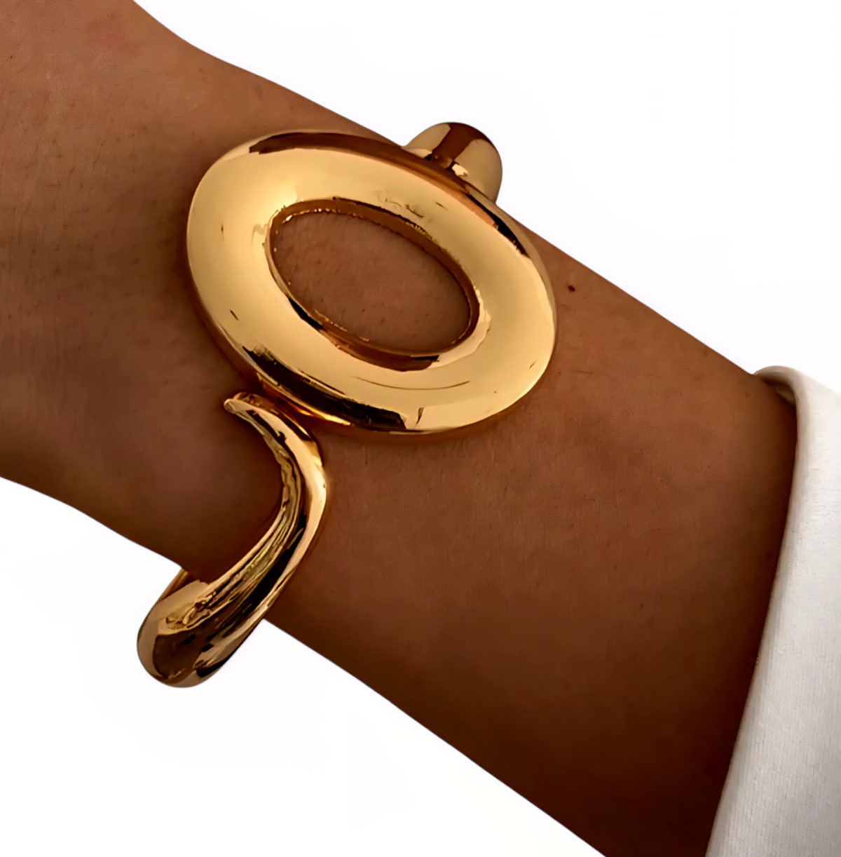 Zoharas Vogue Monarque Gleam Bangles — elegant gold bangle set with sculpted curves, styled on a velvet jewelry tray.