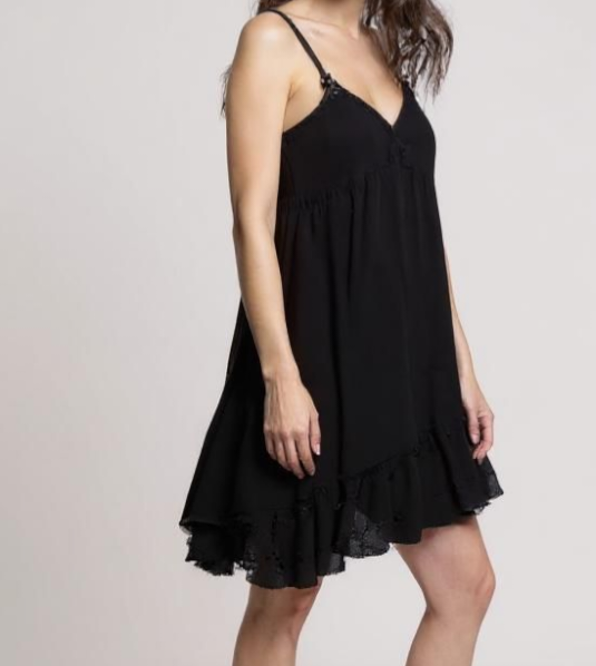black sleeveless dress is designed to flatter with its clean square neckline and adjustable shoulder straps for a customized fit. Crafted from lightweight, breathable fabric, it drapes gracefully into a relaxed, knee-length silhouette that moves with ease. ZoharasVogue 