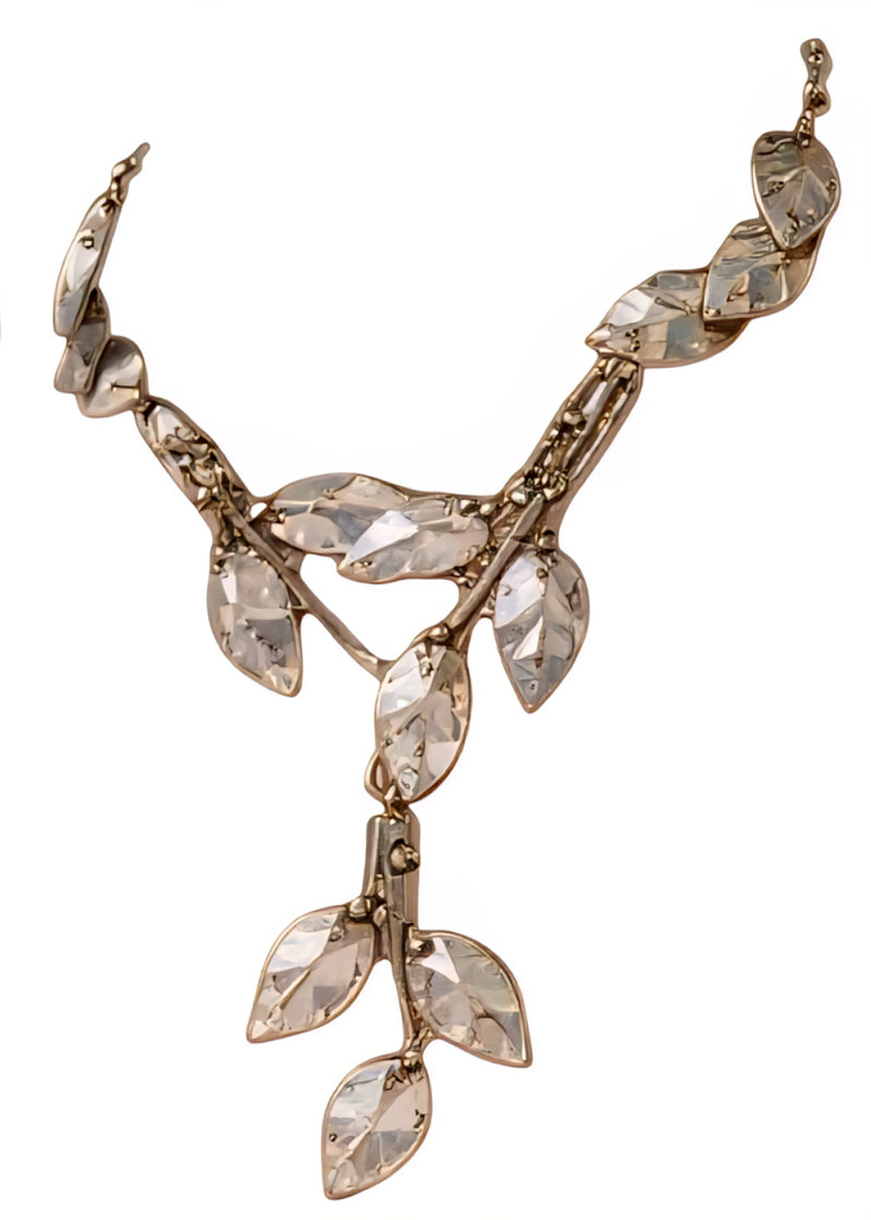 Silver crystal leaf necklace with a sculpted chain design - Zoharas Vogue 