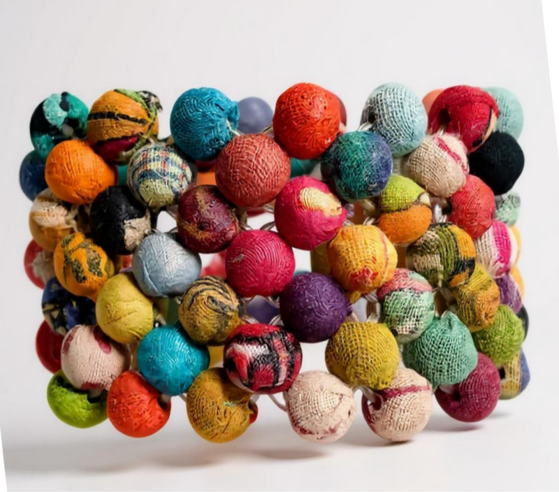 Colorful fabric beaded bracelet with gold accents, handcrafted from repurposed Kantha textiles. Zoharas Vogue