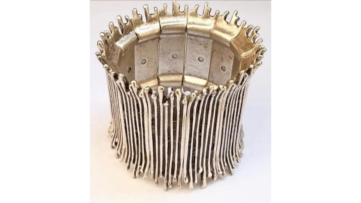 The Lyra Crown Cuff silver-plated extra wide stretch cuff bracelet with sculpted vertical rod design and crown-style rim