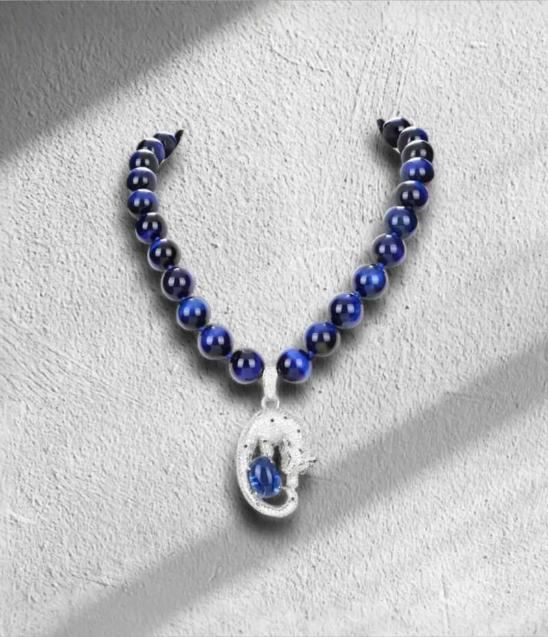 Zia Tiger pendant necklace with CZ accents on a semi-precious blue pearl strand – bold statement jewelry for women by ZoharasVogue