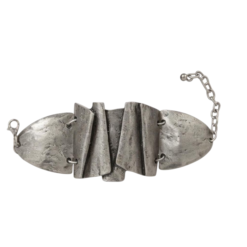 Antique silver boho-style necklace and earring set with handcrafted ethnic detailing on a white background.